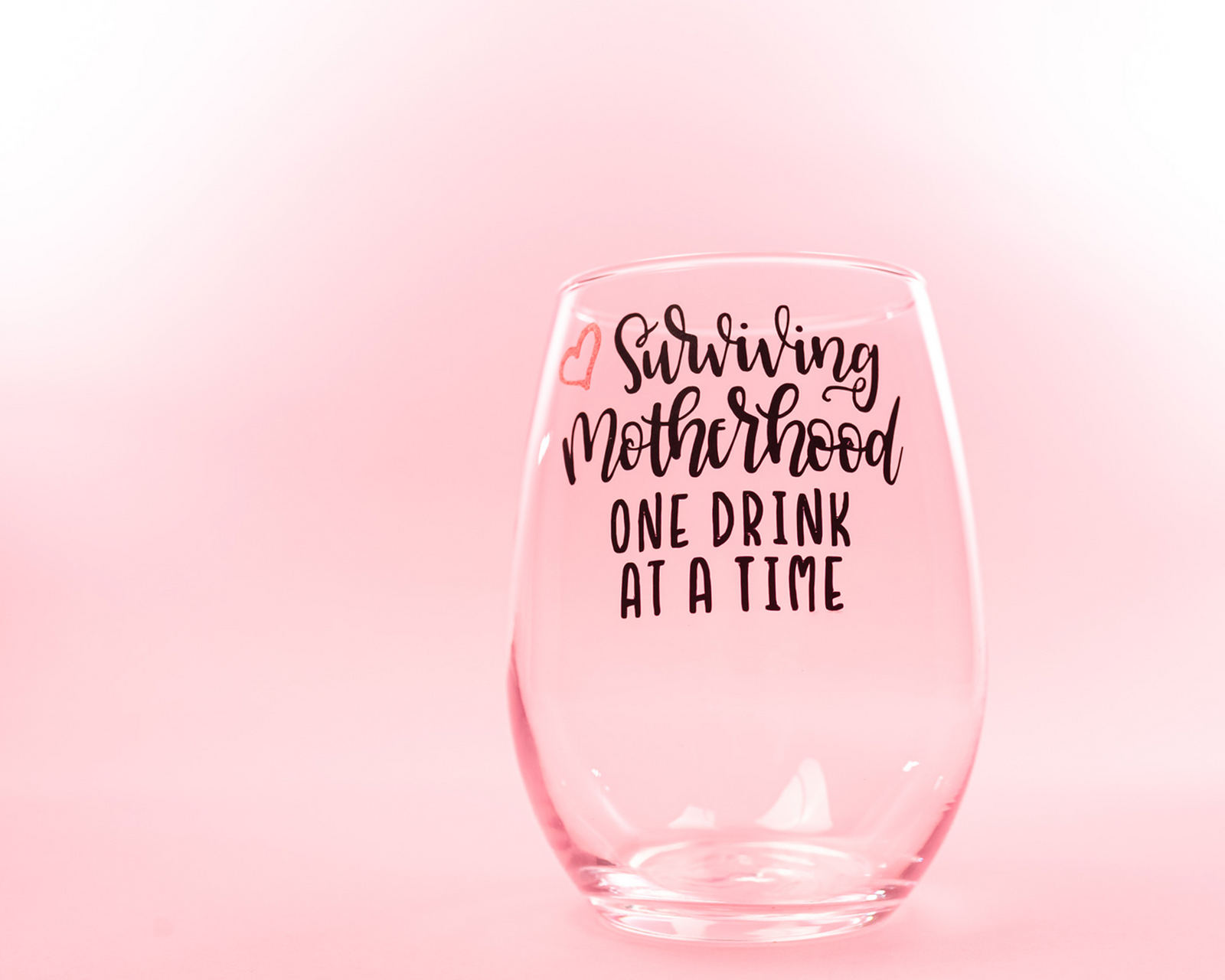 Surviving Motherhood Wine Glass