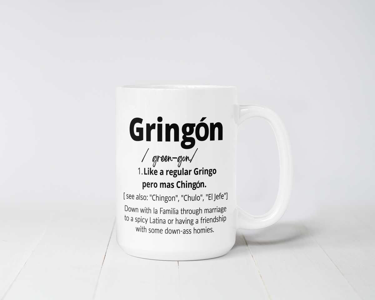 White ceramic mug with bold black text that reads “Gringón – Like a regular Gringo pero más Chingón,” styled with a humorous definition and Latino cultural flair. 15 oz capacity, microwave and dishwasher safe.